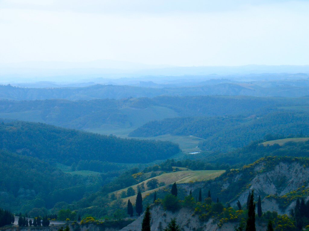An example of atmospheric perspective, where colors shift bluish and contrasts diminish in the distance.